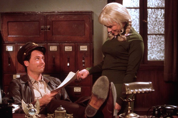 Greg Kinnear and Maria Bello in Auto Focus