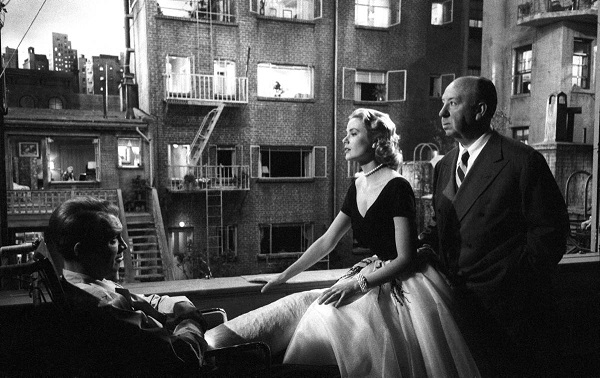 Jimmy Stewart, Grace Kelly and Hitch on the set of Rear Window