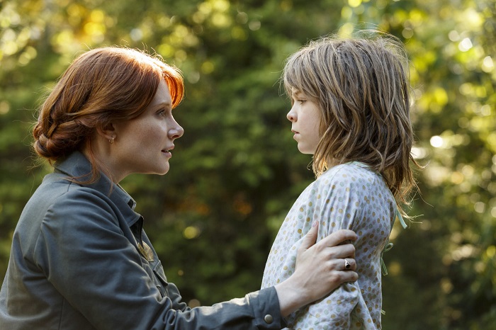 Bryce Dallas Howard and Oakes Fegley in Pete's Dragon