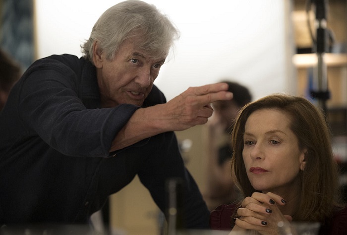 Paul Verhoeven and Isabelle Huppert on the set of Elle