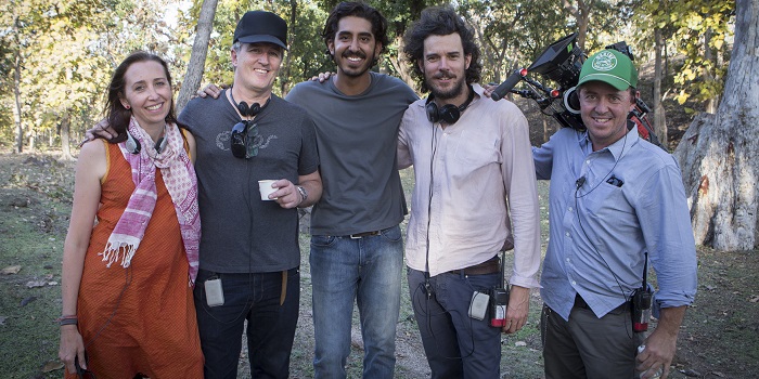 Producer, Angie Fielder; Luke Davies; actor, Dev Patel; director, Garth Davis; and cinematographer, Greig Fraser on the set of Lion
